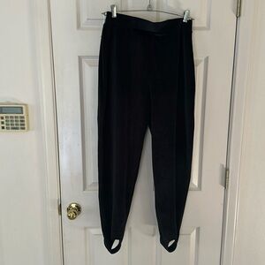 Black velvet leggings with foot loop size XL.